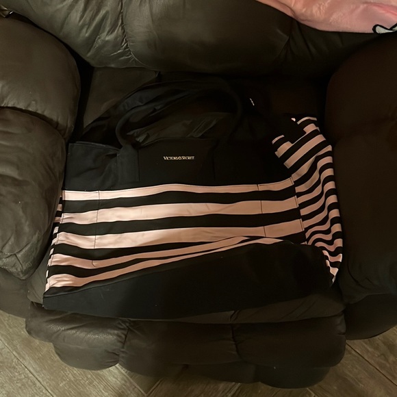 Victoria Secret large pink and black tote bag in used condition.  (See pictures) - Picture 1 of 5